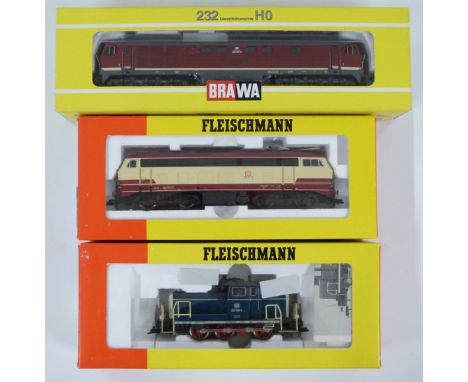 Two Fleischmann 00 gauge model railway locomotives, comprising Bo-Bo diesel locomotive 974234 and 0-6-0 diesel shunter, toget