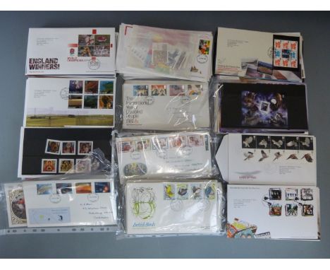 A collection of GB first day covers 1980-2017 separated into yearly packets from 1990, includes mint stamps and some booklets