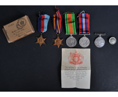 A WWII Second World War medal group relating to one C. R Wyatt of the Royal Navy Volunteer Reserves. Medals comprising his De