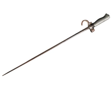 An original 19th Century French M1886 Lebel rifle bayonet. The bayonet having a smooth brass grip with working catch mechanis