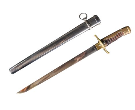 An unusual early 20th Century Japanese style tanto sword / knife. The brass hilt with backstrap engraved with busting sunbeam