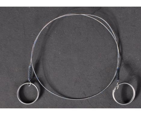 A vintage British Army Commando barbed wire ' garotte '.&nbsp;The garotte of usual simple form, with steel hoop handles and a