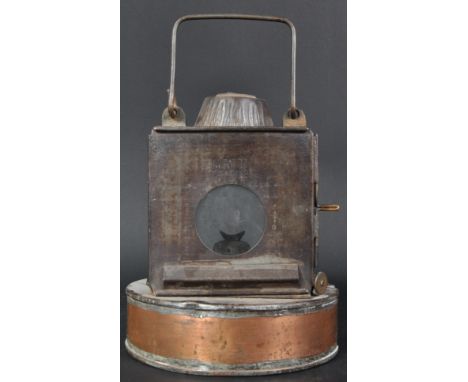 Railwayana - an early 20th Century GWR Great Western Railways signal lamp. Copper reservoir with a square metal unit engraved
