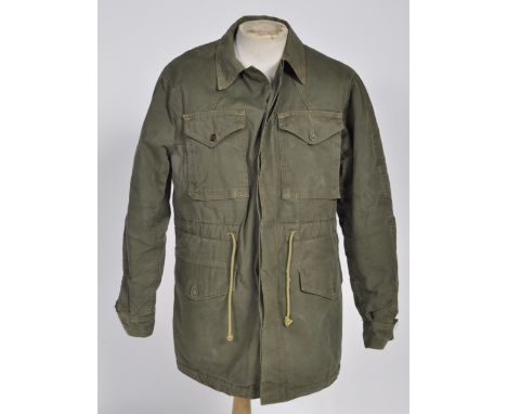 An original Falklands War era Argentine Air Force bring back combat jacket. Durable cotton twill in olive drab with buttoned 