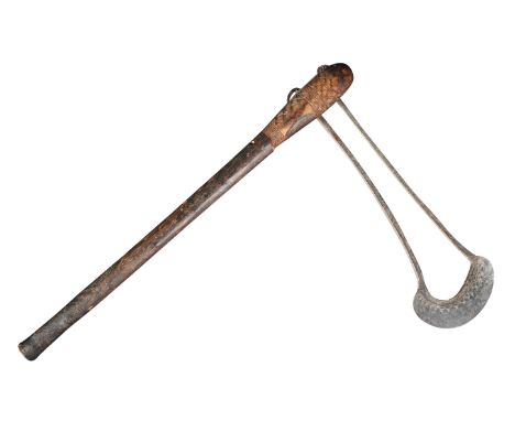 A 19th Century West African tribal axe having a hardwood shaft with bulbous upper portion carved with geometric shapes. The&n