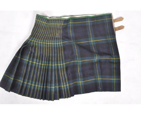 A post-WWII Second World War 1947 dated War Department issued Gordons Highlander's issued uniform Kilt. Retains original labe