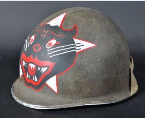 A Vietnam War era US United States M1 steel combat helmet, with applied decoration for the 44th ARVN Rangers / Vietnamese Ran