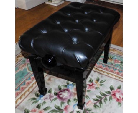Piano StoolA concert adjustable piano stool in a bright ebonised finish with button leather top.