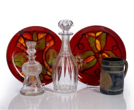 Group of piecesto include two Poole Aegean pattern plates, 25cm diameter, two glass decanters, and a stoneware tankard, (5)At