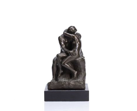 After Auguste Rodin (1840-1917) 'The Kiss' bronzed resin sculpture on painted black base, bears label to the underside 'Natio