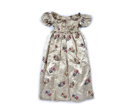 Cream silk skirt and bodicedecorated with embroidered flowers all over, skirt 42cm across (when fastened) x 98cm long (2)Bodi