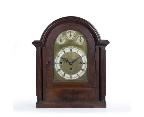 Earl of Bristol 19th Century, table clock, the mahogany outer case with fret carved side panels and back, with brass face and