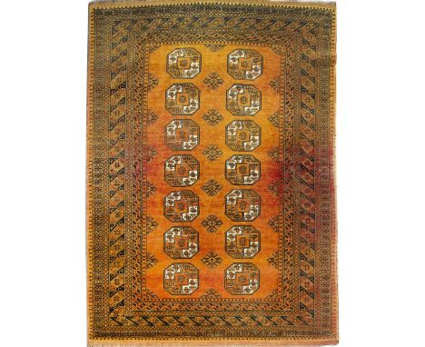 Gold ground sofa carpet Afghanistan, with two rows of elephant foot medallions, 300cm x 203cmPatches of slightly different co