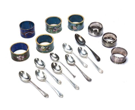 Collection of items consisting of: Five cloisonné enamel napkin rings, three silver napkin rings and nine silver teaspoons, o