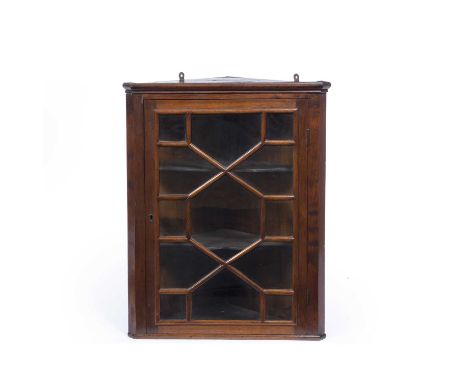 Small mahogany corner cupboardwith glazed front, 65cm x 50cmSome light wear.
