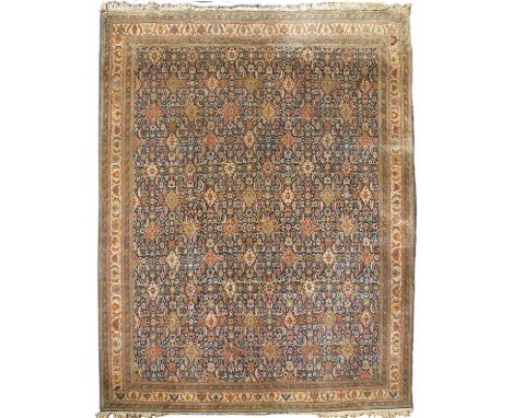 Meshed blue ground carpetwith all over central panel with foliate stylised designs, 349cm x 245cmOverall wear and some marks 