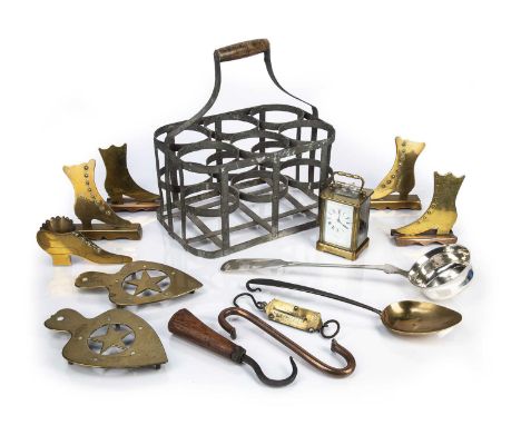 Collection of items consisting of: a six division bottle holder or carrier, brass cased carriage clock, trivets, silver plate