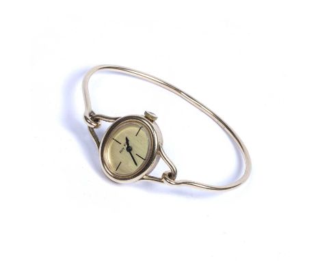 Lady's watch on bangle strap by Roy King 9ct gold, hallmarked to the bangle, and to the case, 6cm x 4.5cm, 17g approx overall