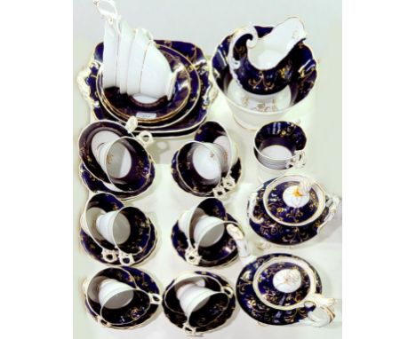 AN H & R DANIEL 'SECOND BELL' SHAPED COBALT GROUND GILT TEA SERVICE, CIRCA 1840