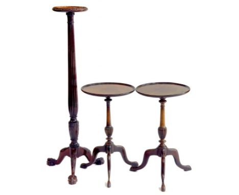 A PAIR OF MAHOGANY TRIPOD TABLES AND A MAHOGANY PLANT STAND