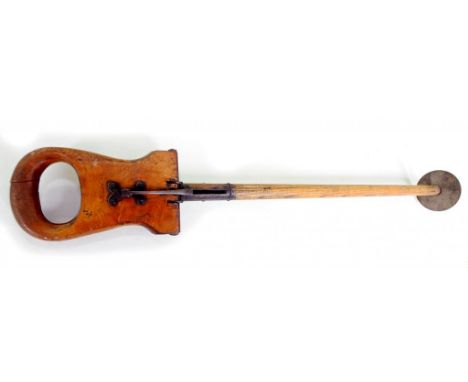 AN EARLY 20TH CENTURY WALNUT, HICKORY, BRASS AND IRON SHOOTING STICK