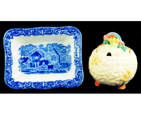 CLARICE CLIFF.  A NEWPORT POTTERY CELTIC HARVEST PRESERVE POT AND COVER AND A GEORGE JONES AND SONS BLUE PRINTED EARTHENWARE 