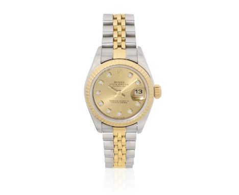 Rolex. A lady's stainless steel and gold diamond set calendar bracelet watchModel: DatejustReference: 79173Date: Circa 2001Mo