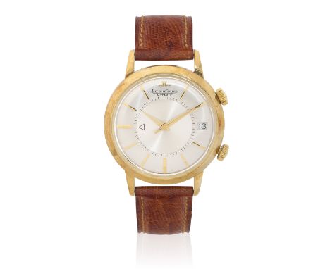 Jaeger-LeCoultre. A 14K gold and stainless steel bumper automatic calendar wristwatch with alarmModel: MemovoxReference: E855