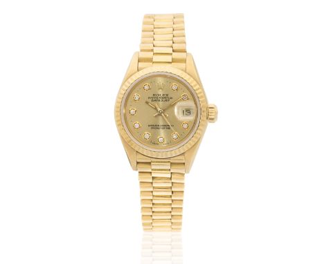 Rolex. A lady's 18K gold diamond set automatic calendar bracelet watchModel: DatejustReference: 69178Date: Circa 1986Movement