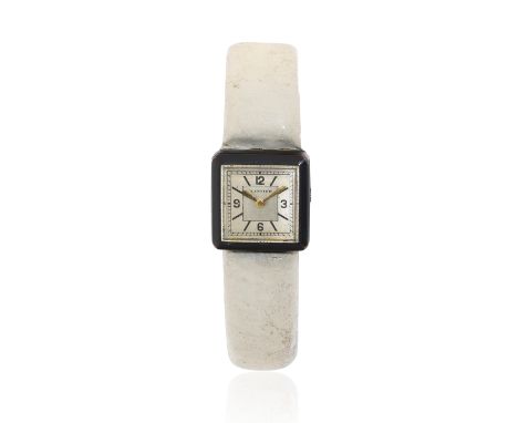 Cartier. An unusual black enamel and silver manual wind bangle watchDate: Circa 1936Movement: 16-jewel manual wind, No.62882D