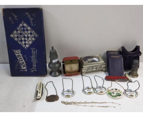 A mixed lot to include decanter labels, travel clock, silver plated trinket box and other items Location:If there is no condi