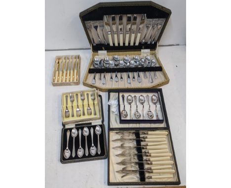 Cased silver plated flatware to include a set of cake spoons, a set of teaspoons and othersLocationIf there is no condition r