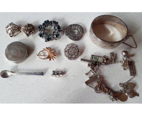 A small group of vintage costume jewellery to include silver items, an engraved silver bangle makers mark S&P (Smith & Pepper