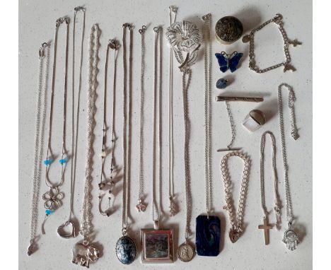 A collection of silver and silver tone jewellery and small collectables to include a small silver and abalone pill box, a sil