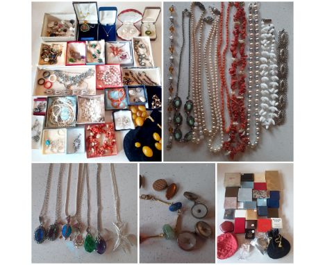 A quantity of vintage costume jewellery to include 2 coral necklaces, shirt studs, mid 20th Century clip-on earrings, loose a