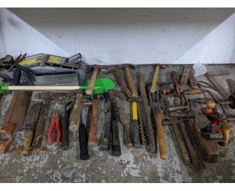 A mixed lot of tools and gardening tools including a trolley jack, hobby fretsaw, spades, vintage saws, a Richmond Precision 