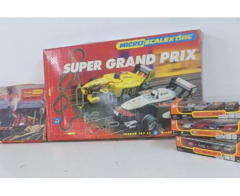 A mixed lot of toys to include a micro Scalextric super grand prix, Tri-ang Hornby The Midlander electric train set and other
