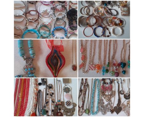 A large quantity of modern and vintage fashion jewellery comprising unused High Street jewellery, mixed bangles and bracelets