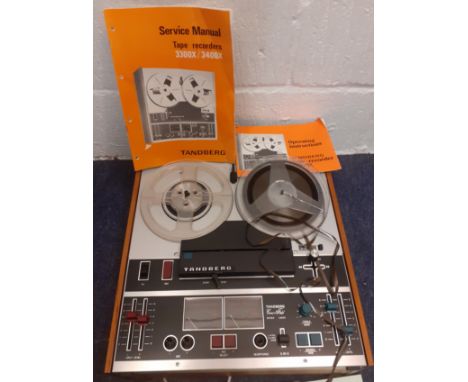 A vintage Tandberg Crossfield 3400X reel to reel tape recorder with cables and manuals. Location:If there is no condition rep
