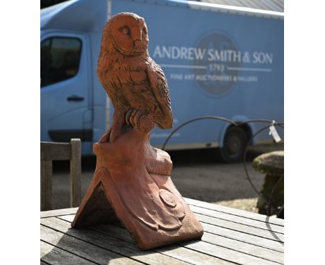 A reconstituted aged terracotta 'owl' ridge tile 
