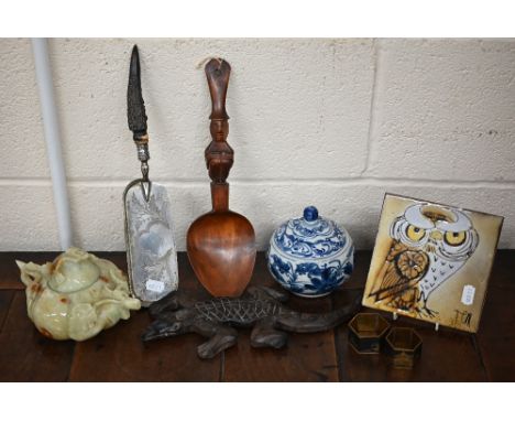 A ceramic tile with cartoon owl, a blue and white bowl and cover, Chinese soapstone wine-jug and other collectables 