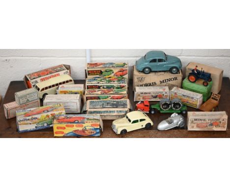 A collection of boxed Minic tinplate vehicles, including Double Deck Bus, No.2 Saloon Car, No.2 Sports Car, Mechanical Horse 