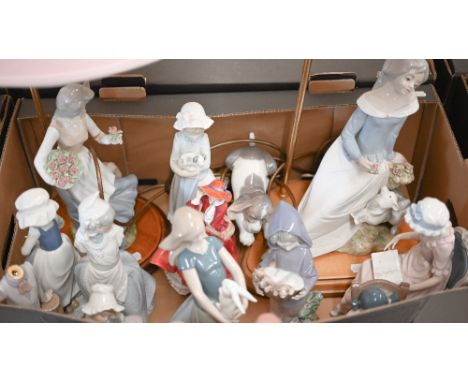 Four Lladro figures - girl reading in a chair, young girl sleeping in a rocking chair, puppy and boy with kittens to/w six Na