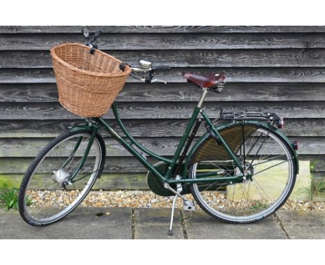A Pashley Sovereign step-through bicycle c/with leather Brooks saddle, wicker basket and led lights (new price £900) 