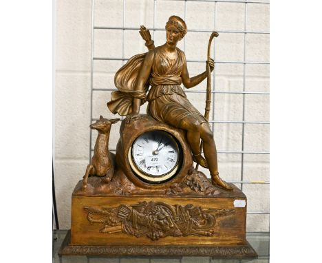 A late 19th century bronzed spelter mantel clock case, surmounted by the figure of a classical huntress - probably Diana, 48 