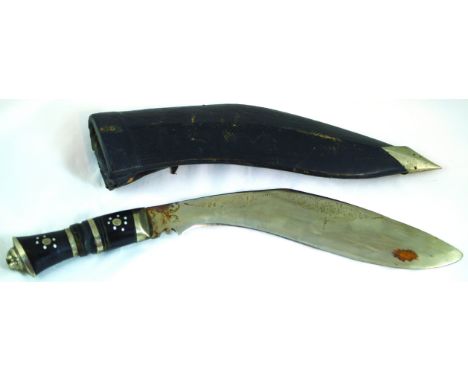 KUKRI (?) KNIFE. Complete with leather case, used as both a tool and as a weapon in Nepal. Marked INDIA on blade. A character