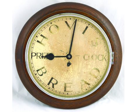 ADVERTISING CLOCK. 15.5ins diam, wooden wall clock with HOVIS/ PRIZE CLOCK BREAD to clock face. In working order. (Recently f