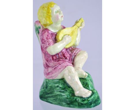 ANGEL GIRL FIGURINE. 6.75ins tall. Another early heavy pottery figure of angel playing lute in pink, yellow, white & green. (