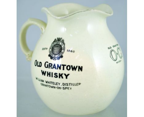 OLD GRANTOWN WHISKY PUB JUG. 6ins tall, white glaze, bulbous body with 4 way pouring rim, black transfer OLD GRANTOWN/ WHISKY
