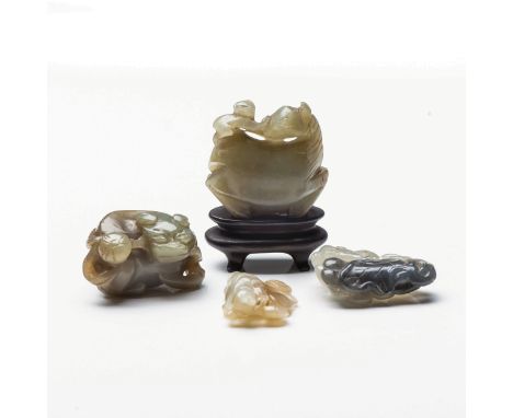 A CHINESE JADE 'HORSE AND MONKEY' CARVING Carved as a resting horse with a monkey on the back; together with a carving of a l